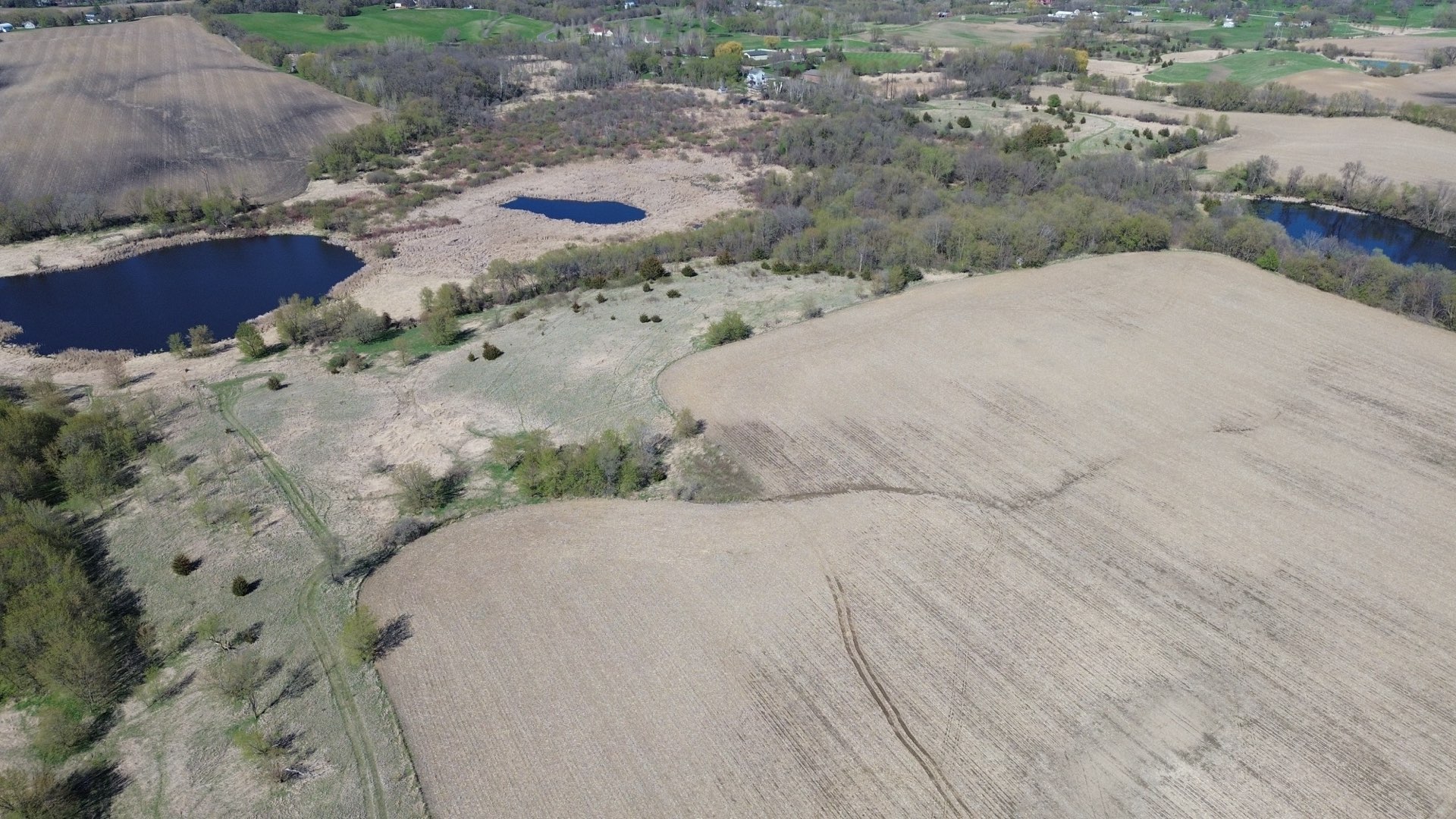 Aerial view of the Dayton area with farmland and Twin Cities skyline in the distance